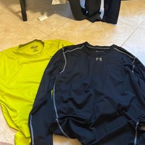 HARDLY WORN UNDER ARMOR AND NIKE SHIRT